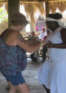 Karol learning the Garifuna Dance?  She can move her hips!