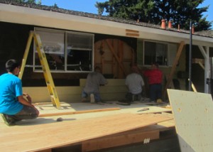 The siding is coming off the front, and their is a floor!