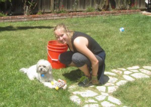 Amy and Tucker removing weeds