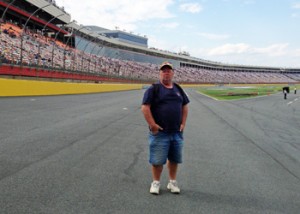 Paul standing at the entrance from pit row onto turn 1